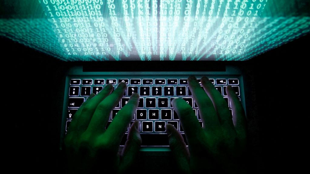 User cleaning and managing files on a laptop for faster operation